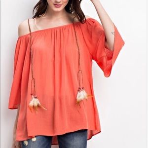 Flowy top with feather details